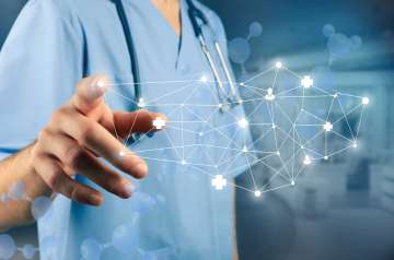 Doctor engaging with medical hologram diagram