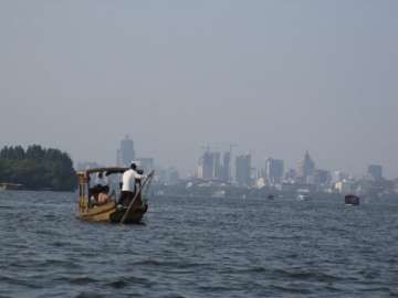 A small boat sailing on the ocean