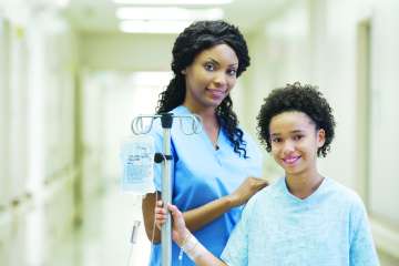 Doctor and child smiling