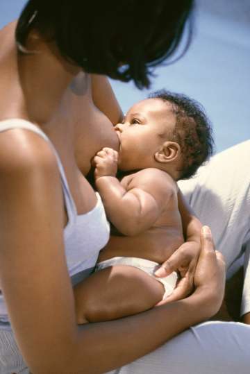 Woman breastfeeding her child