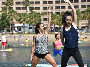 Residents doing Yoga at the beach