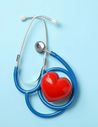 stethoscope with a rubber heart next to