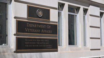 Sign for the Department of Veterans Affairs on a building exterior.
