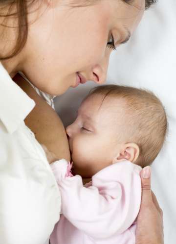 Woman breastfeeding her child