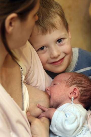 Woman breastfeeding her child