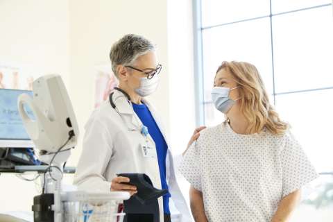 Physician and Patient with masks on