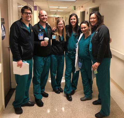 Surgeons in a hallway