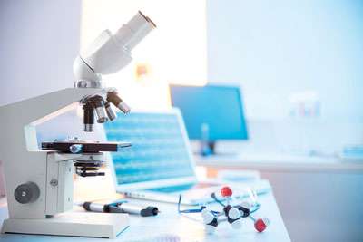 A microscope on a medical office desk