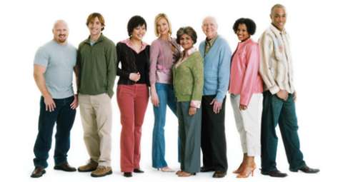 Group of people standing in front of white background