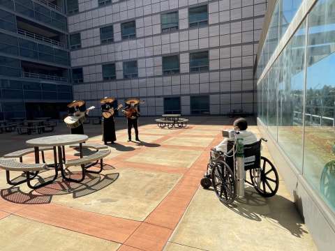 Mariachi band performing outdoors at UCLA Health, fulfilling a patient's final wish through the 3 Wishes Program.
