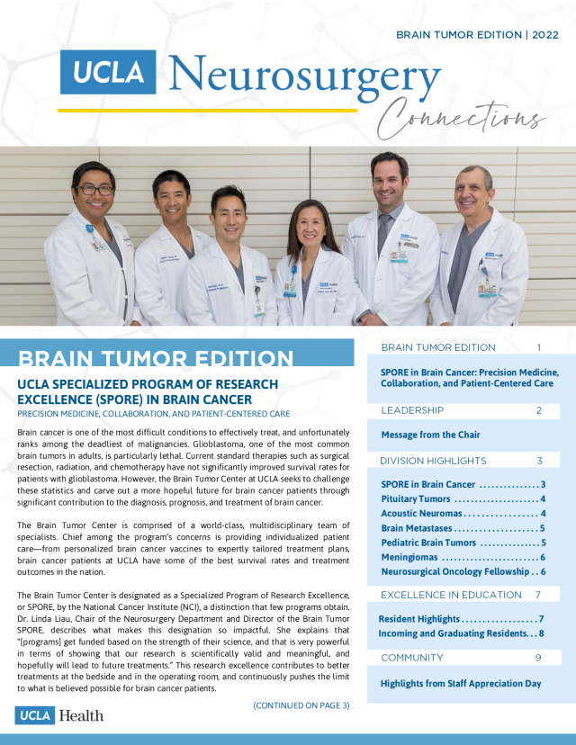 Brain tumor center team posing wearing their white lab coats