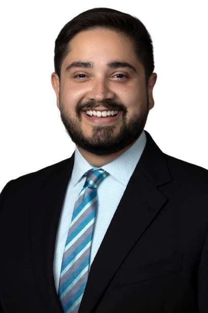 Smiling person in dark suit and blue striped tie on white background