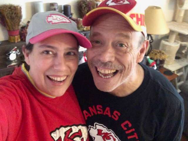 Dena and Richard Malmos in Chief's gear.