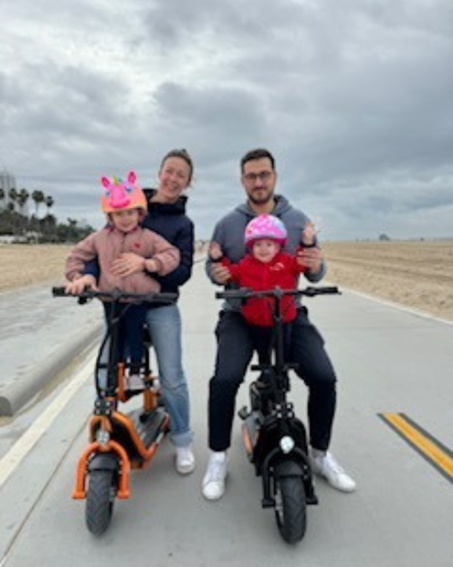 Amelia Delaporte, MD and family on bicycles 
