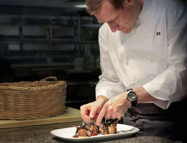 Sonny Sweetman plating food. 