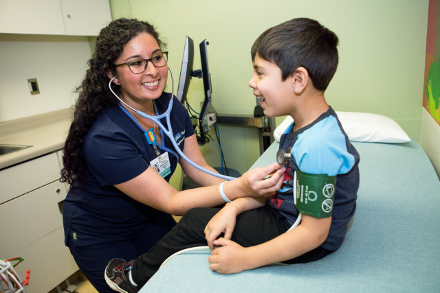 nurse and pediatric patient