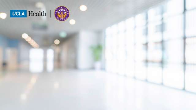 Zoom background of a hallway in UCLA Health with the UCLA logo and LA Sparks logo