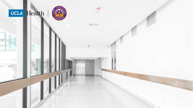 Zoom background of a hallway in UCLA Health with the UCLA logo and LA Sparks logo