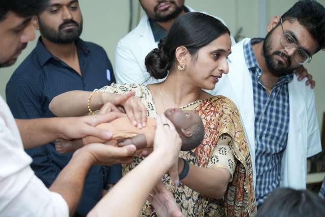 Dr. Aparna Sridhar working with doctors in India