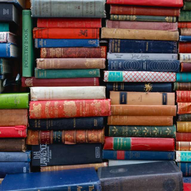 image of a lot of columns of stacked books