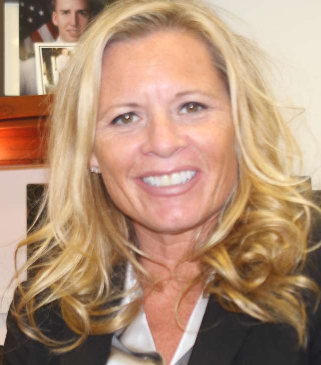 Headshot of Andrea Hevener in Black Blazer