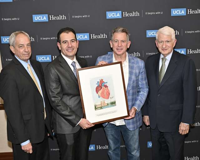 From left: John Mazziotta, Tamer Sallam, Kirk Dunn and Chancellor Gene Block. Photo: Todd Cheney