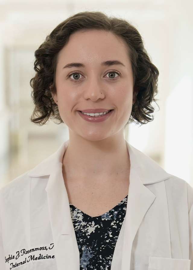 Headshot of Sophie Rosenmoss, MD in a white Lab Coat