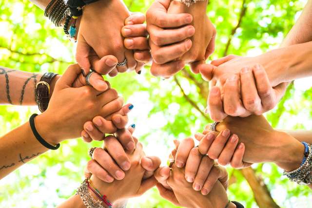 Holding hands in a circle