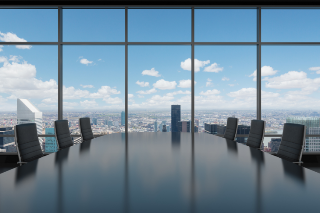 empty conference room with view of blue skies