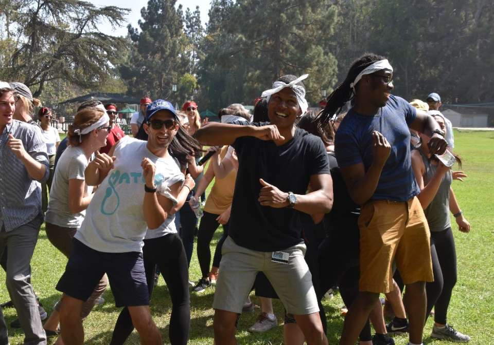 People dancing in a field