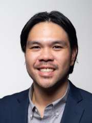 headshot of Gabriel Sanchez in blue suit