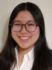 Michelle Duong, student researcher, smiling headshot wearing glasses