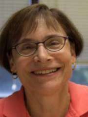 headshot of Teresa Seeman in a pink shirt