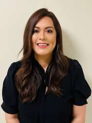 headshot of Maria Ventura in black blouse