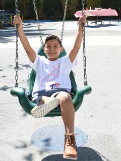 Efrain Ordoñez Jr. Sitting on a swing