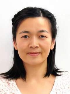 Headshot of Dr. Yahzen zhu facing camera, neutral expression