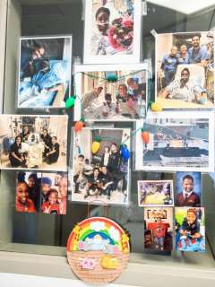 Carolene Newton photo collage with family snapshots and a small rainbow basket