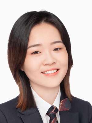 Fei Jiang smiling in a professional headshot wearing a suit and tie