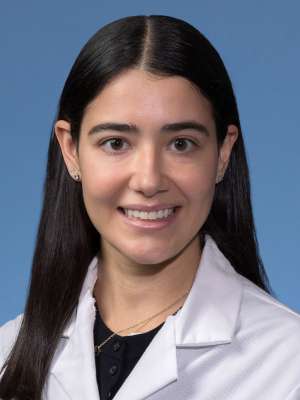 Heather Ross, MD in a white lab coat