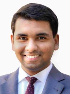 Mohammed Hisham Siddeek, MD smiling headshot in suit and tie