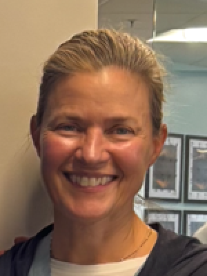 Tish Tighe, FNP smiling.