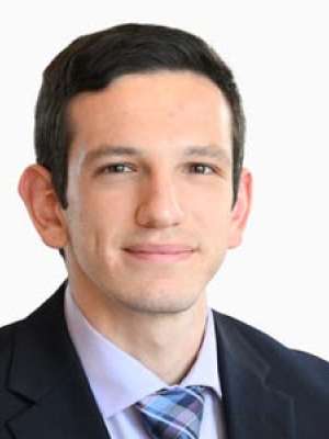 Alejandro Sánchez Jiménez professional headshot in suit and tie