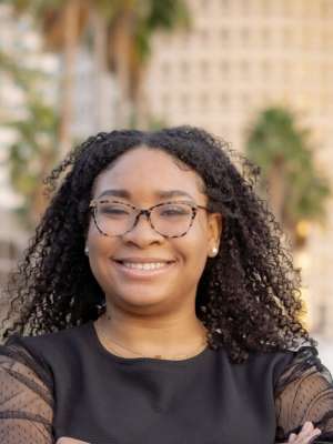 Dr. Skye Bristol smiling with arms crossed.