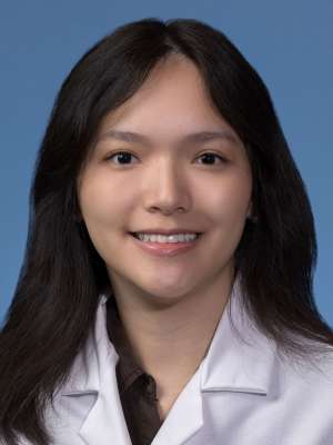 Chuying Jessica Su, MD wearing a white lab coat