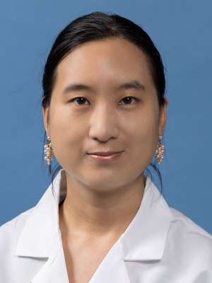 Cindy Tay, MD in white lab coat