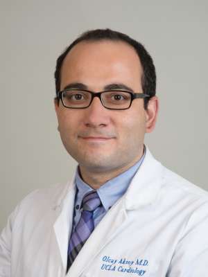 Olcay Aksoy, MD