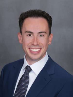 headshot of Dr. Joseph Gaballa in a blue suit