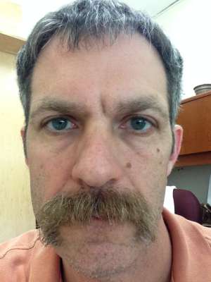 face of a person in an office setting