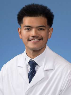 A headshot of Reant Mapue, MD