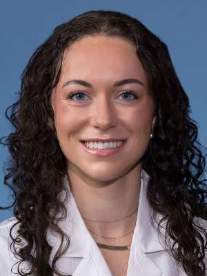 Mariah Schroeder, MD in a white lab coat